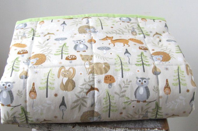 Couverture matelassée, piquée, pour bébé avec pochon de rangement 