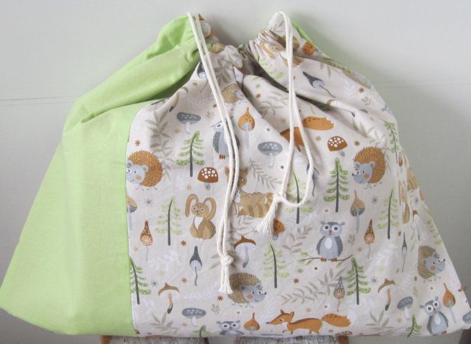 Couverture matelassée, piquée, pour bébé avec pochon de rangement 